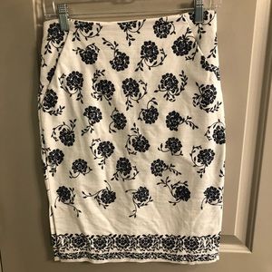 White skirt with blue details